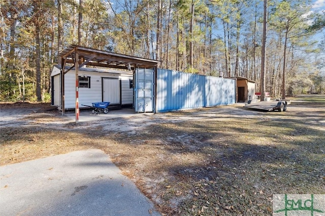 view of outbuilding with a garage