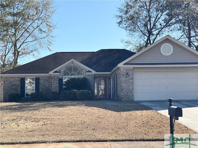 ranch-style house featuring a garage