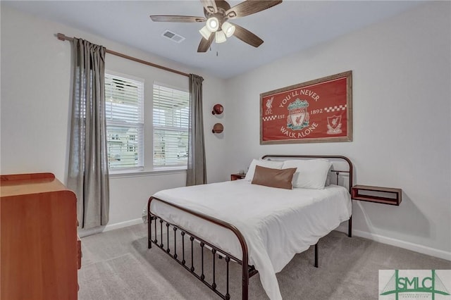 carpeted bedroom with ceiling fan