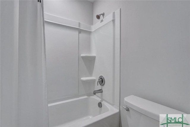 bathroom featuring toilet and shower / bathtub combination