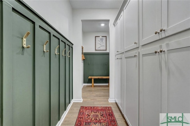 mudroom with light wood-type flooring