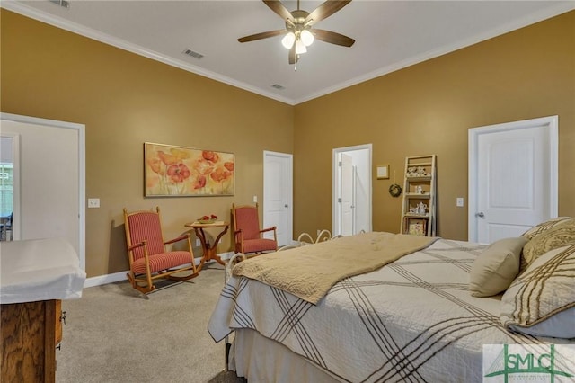 bedroom with carpet floors, ceiling fan, and crown molding