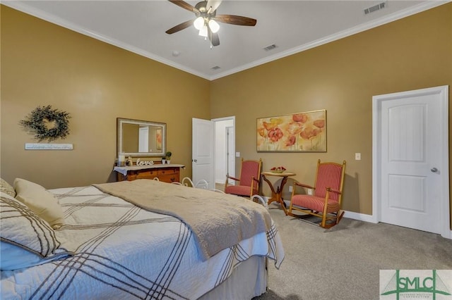 bedroom with carpet, ceiling fan, and ornamental molding