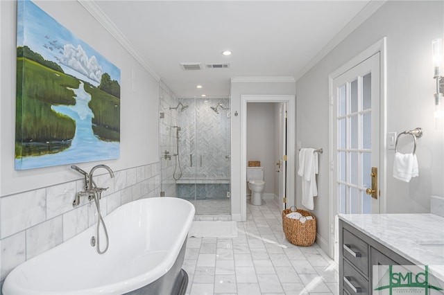 full bathroom featuring toilet, vanity, independent shower and bath, and ornamental molding