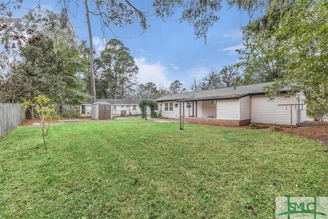 view of yard featuring a storage shed