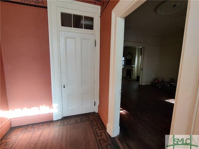 hall featuring dark hardwood / wood-style floors