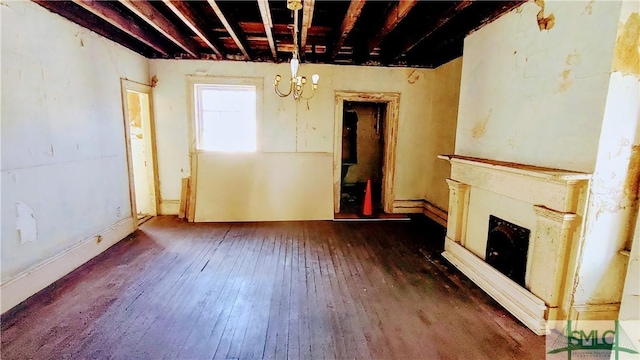 unfurnished living room featuring dark wood-type flooring