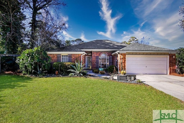 ranch-style house featuring a garage and a front lawn