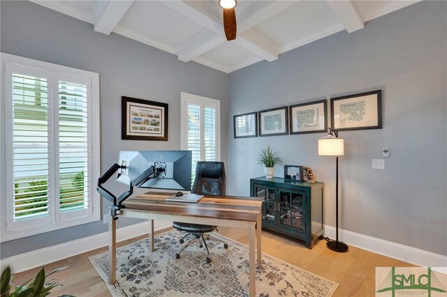 office area with beamed ceiling, ceiling fan, light wood-type flooring, and coffered ceiling