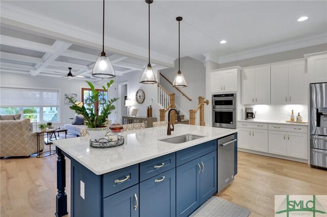 kitchen with white cabinetry, stainless steel appliances, coffered ceiling, beamed ceiling, and decorative light fixtures