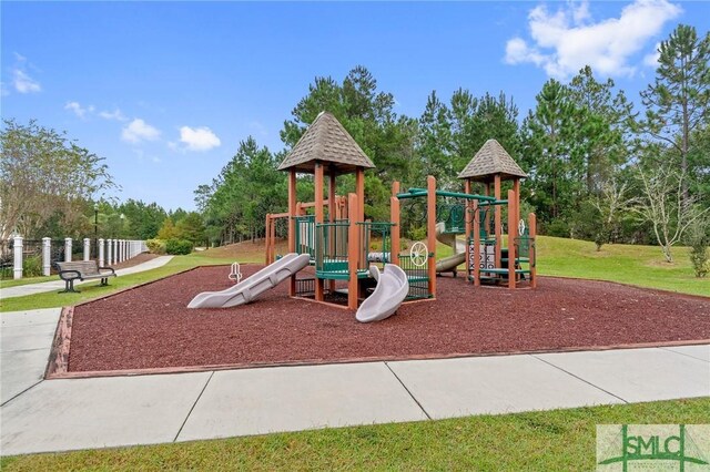 view of play area featuring a yard