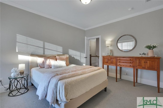 carpeted bedroom with ornamental molding