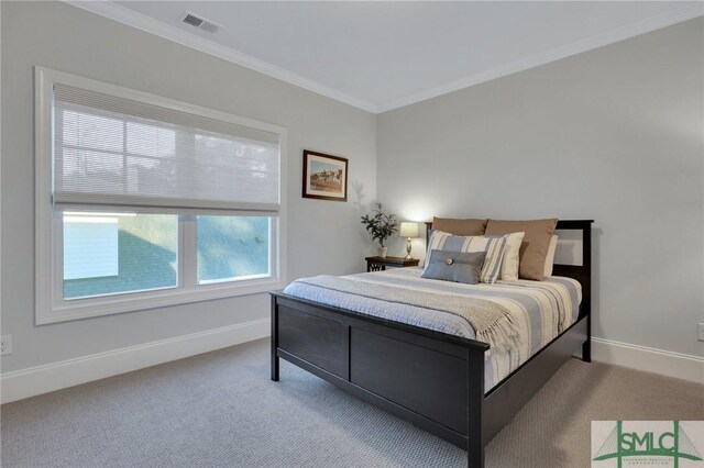 bedroom with light colored carpet and ornamental molding