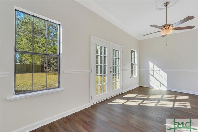 interior space featuring french doors, dark hardwood / wood-style floors, ceiling fan, and ornamental molding