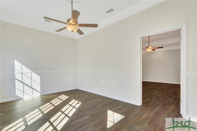 unfurnished room featuring dark hardwood / wood-style floors and ceiling fan