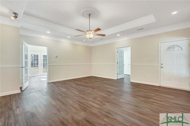 interior space with french doors, a raised ceiling, ceiling fan, and crown molding