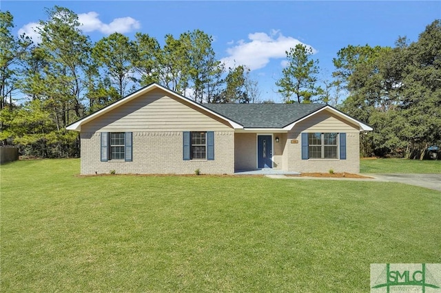 ranch-style home with a front lawn