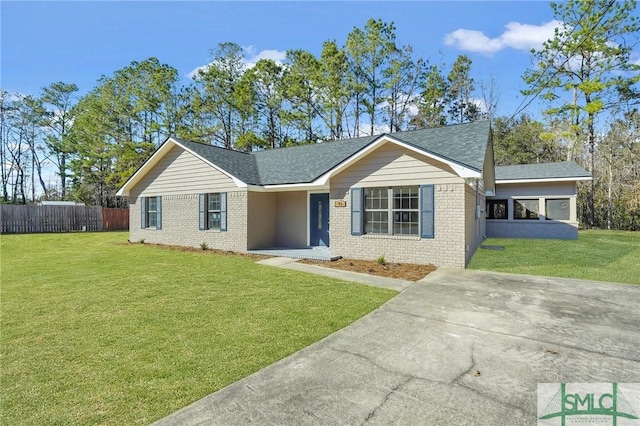 ranch-style house with a front lawn