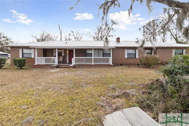 108 Dawson Ln, Ludowici, GA 31316 - view of front of house with a front yard and a porch