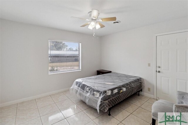 108 Dawson Ln, Ludowici, GA 31316 - bedroom with ceiling fan, light tile patterned floors, and pool table