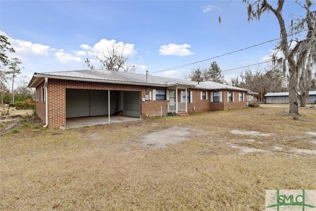 108 Dawson Ln, Ludowici, GA 31316 - back of house with a carport