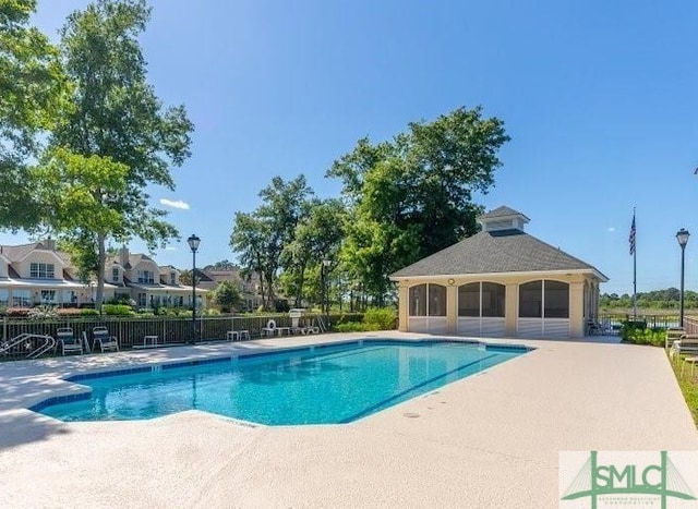 view of swimming pool featuring a patio