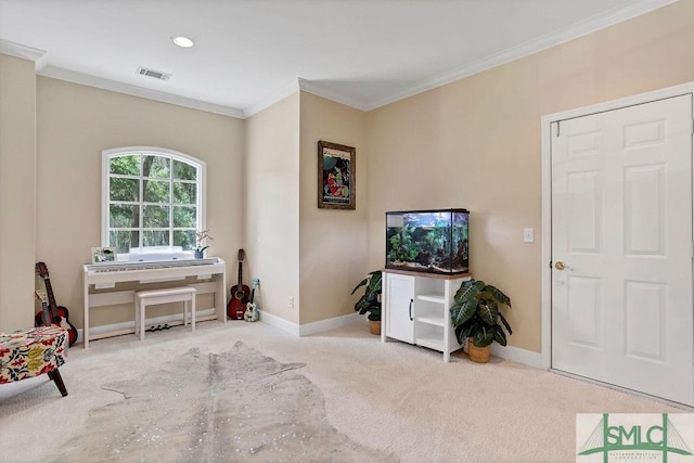 sitting room featuring carpet floors and crown molding