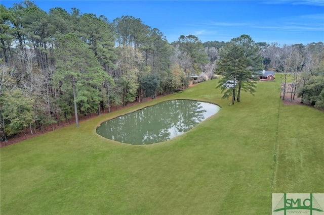 surrounding community with a lawn and a water view