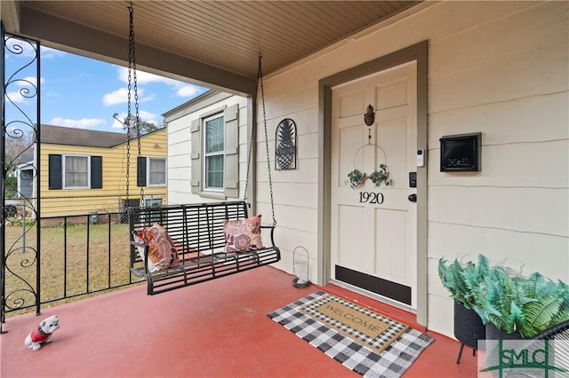 property entrance featuring covered porch