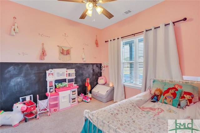 carpeted bedroom with ceiling fan