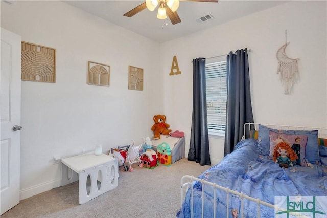 bedroom with ceiling fan and carpet