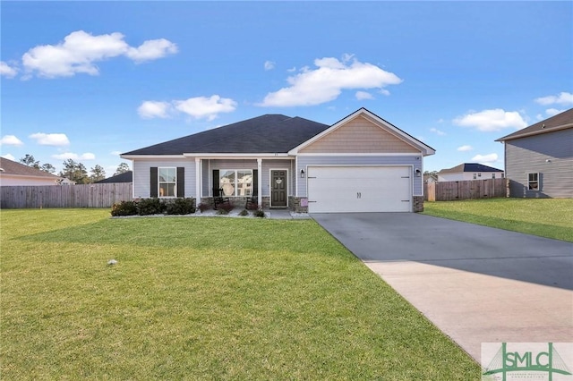 view of front of house with a garage and a front yard