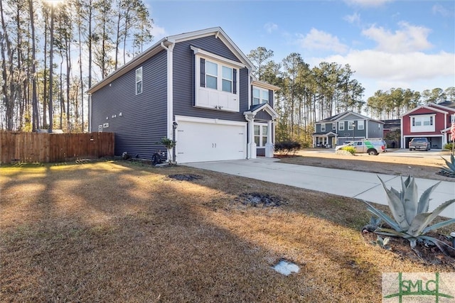 view of side of home with a garage