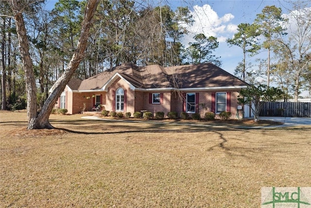 ranch-style house with a front yard