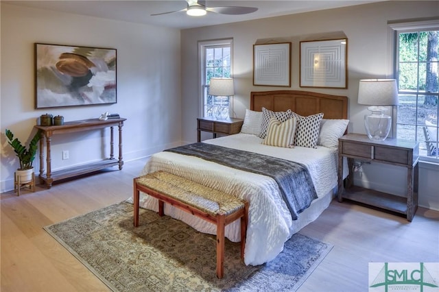 bedroom featuring ceiling fan and hardwood / wood-style floors