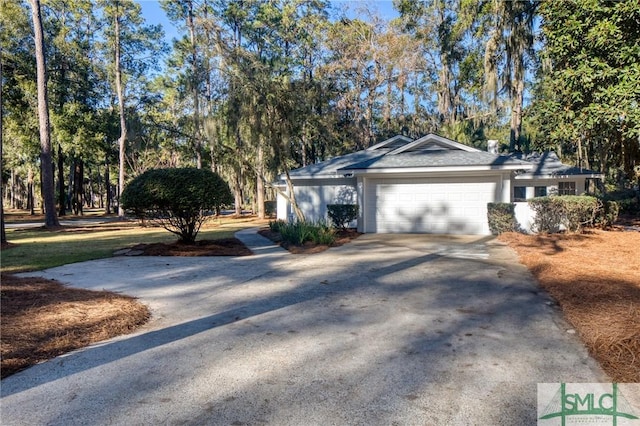 ranch-style home with a garage