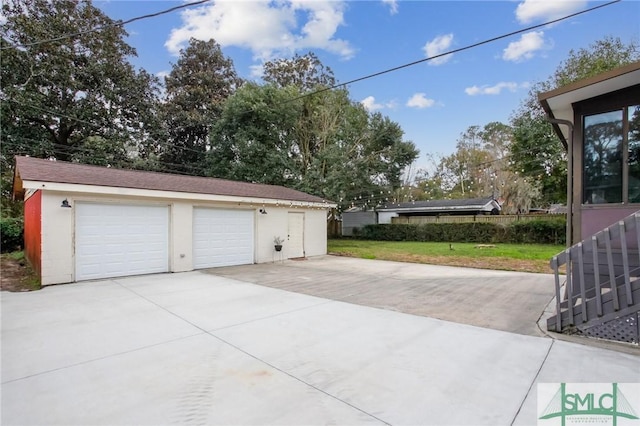 garage with a lawn