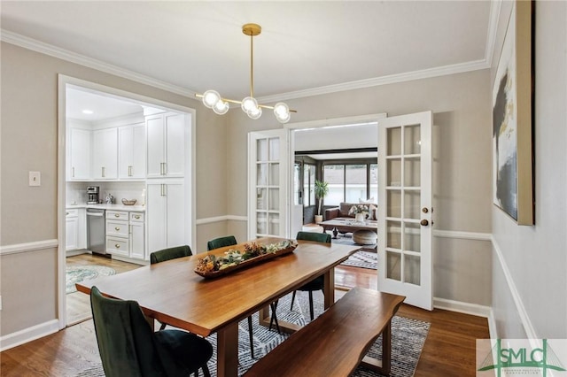 dining room featuring french doors, dark hardwood / wood-style flooring, and crown molding