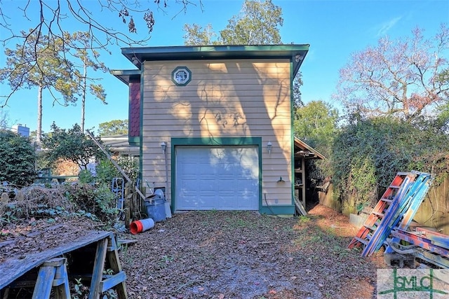 view of home's exterior with a garage