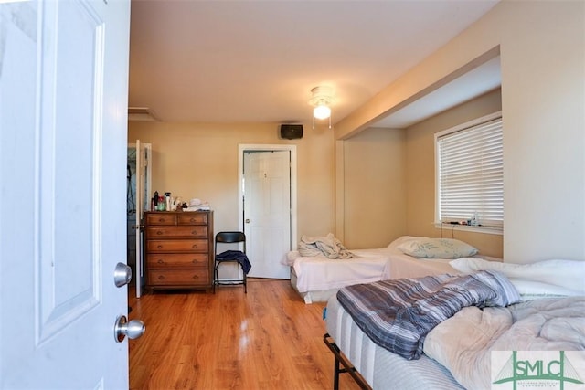 bedroom with light hardwood / wood-style flooring