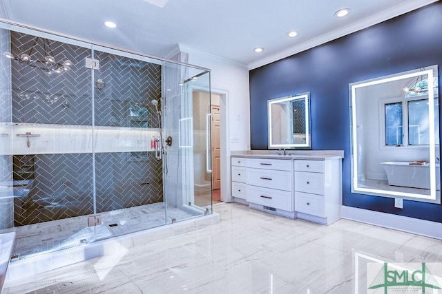 bathroom with vanity, a shower with shower door, and crown molding