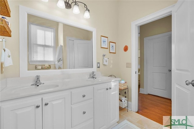 bathroom featuring tile patterned floors and vanity