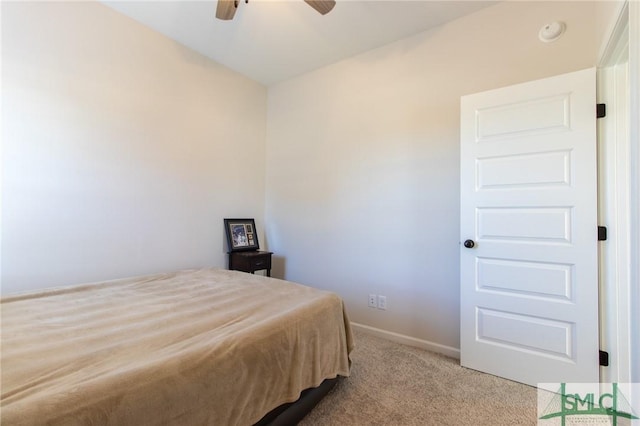 bedroom featuring carpet, a ceiling fan, and baseboards