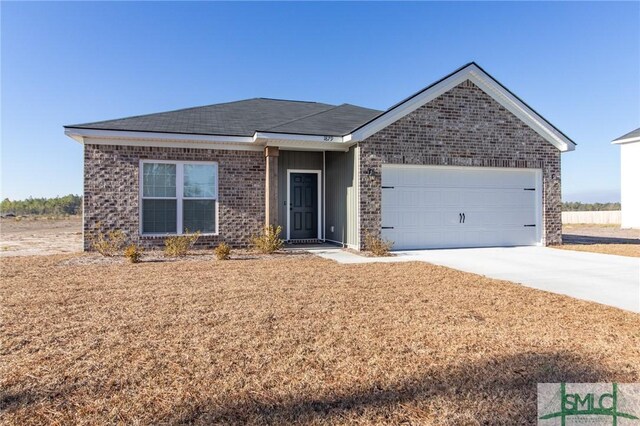 ranch-style house featuring a garage