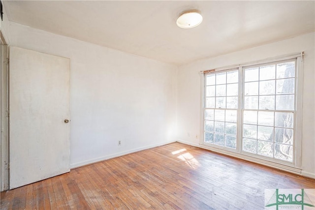 empty room featuring hardwood / wood-style floors