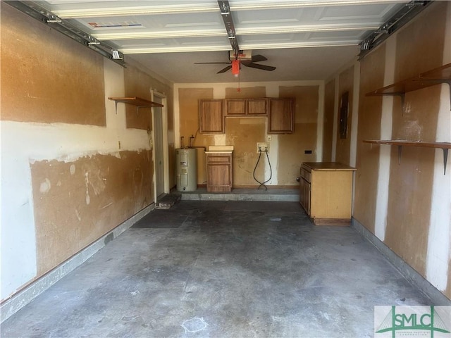 garage with electric water heater and ceiling fan