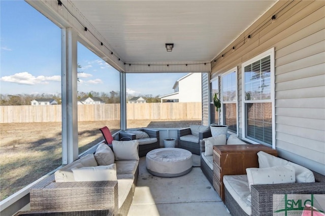 sunroom with plenty of natural light