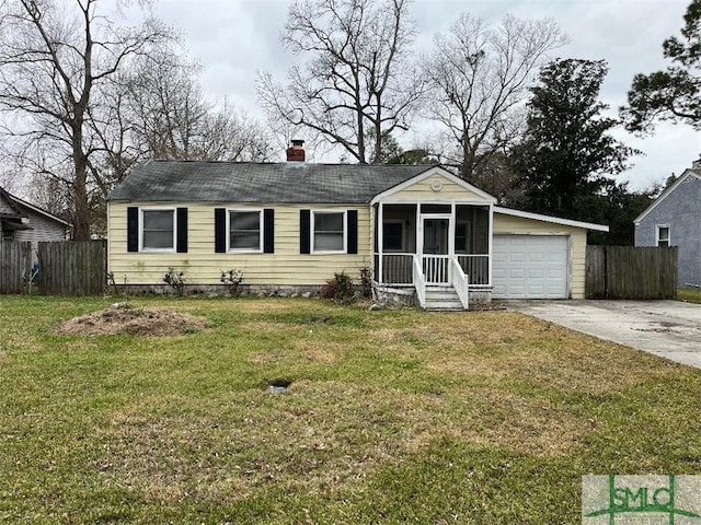 ranch-style house with a garage and a front yard