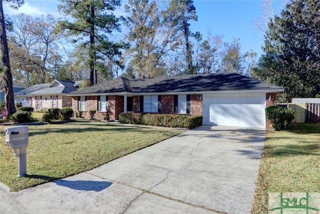 ranch-style home with brick siding, fence, a garage, driveway, and a front lawn