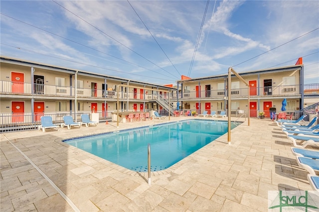 16 Tybrisa St Unit 127, Tybee Island, GA 31328 - community pool featuring a patio area